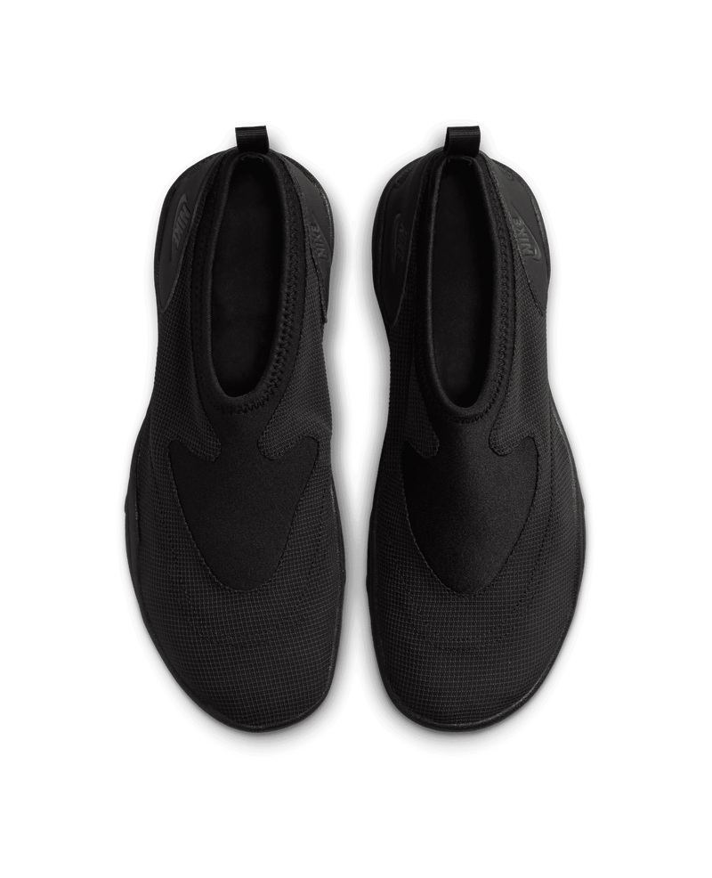 Top-down view of Nike Aqua Turf slip-on shoes in Black and Off Noir.