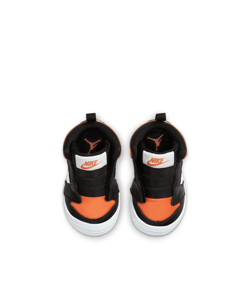 Top-down view of the infant Nike Jordan 1 Crib Bootie in Starfish orange and black.