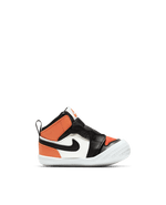 Nike Jordan 1 Crib Bootie infant sneaker in a sail, black, and starfish orange colorway from a side view.