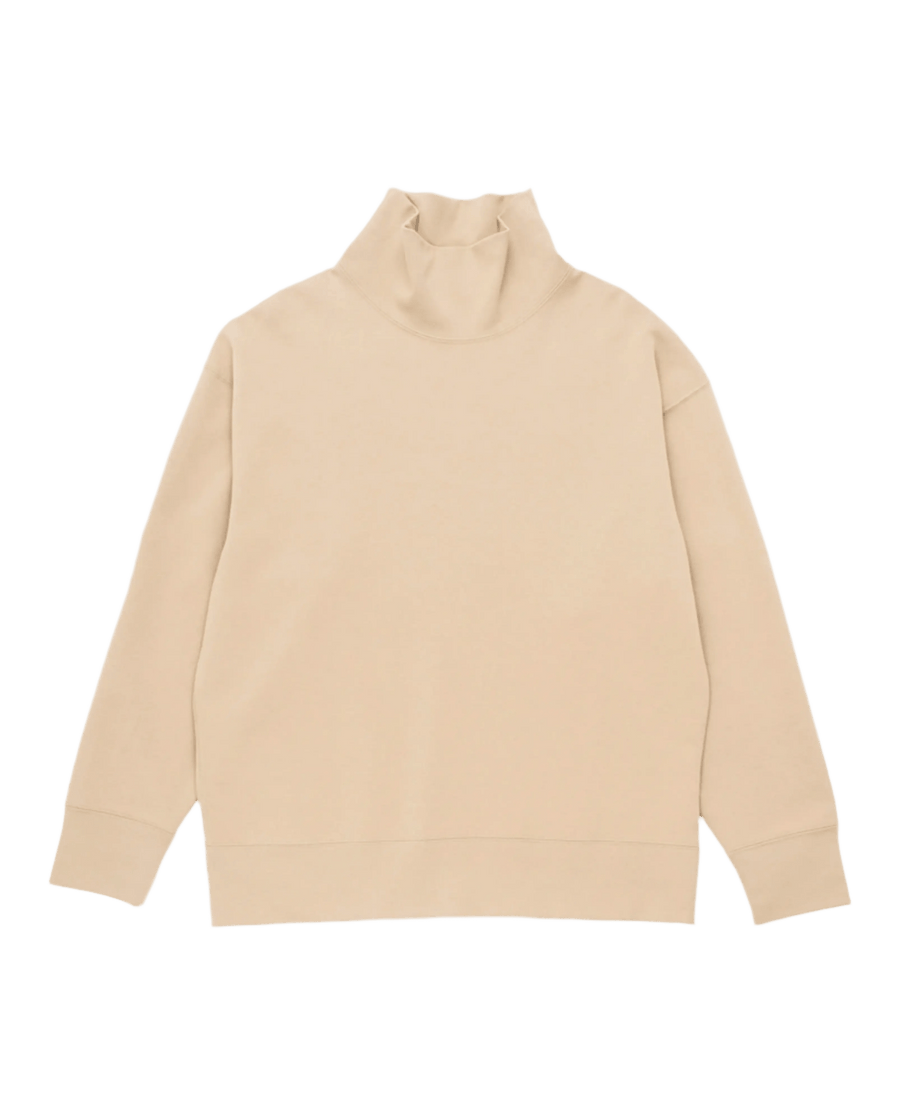 Nike Sportswear Tech Fleece Re-Imagined turtleneck top in khaki beige against a dark background.