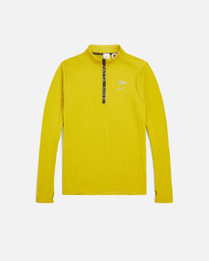 Nike x Patta Running Team half-zip longsleeve top in saffron quartz yellow, shown from the front.
