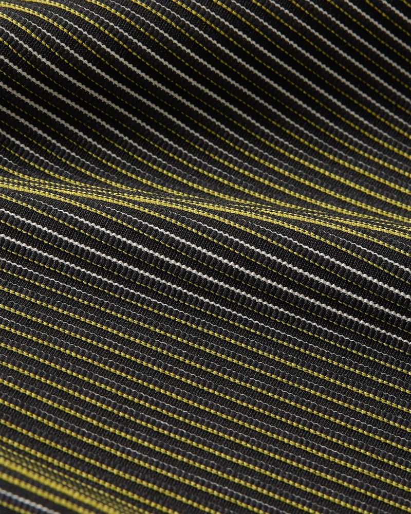 Close-up texture of the ribbed, striped fabric on the Nike x Patta Running Team Leggings.