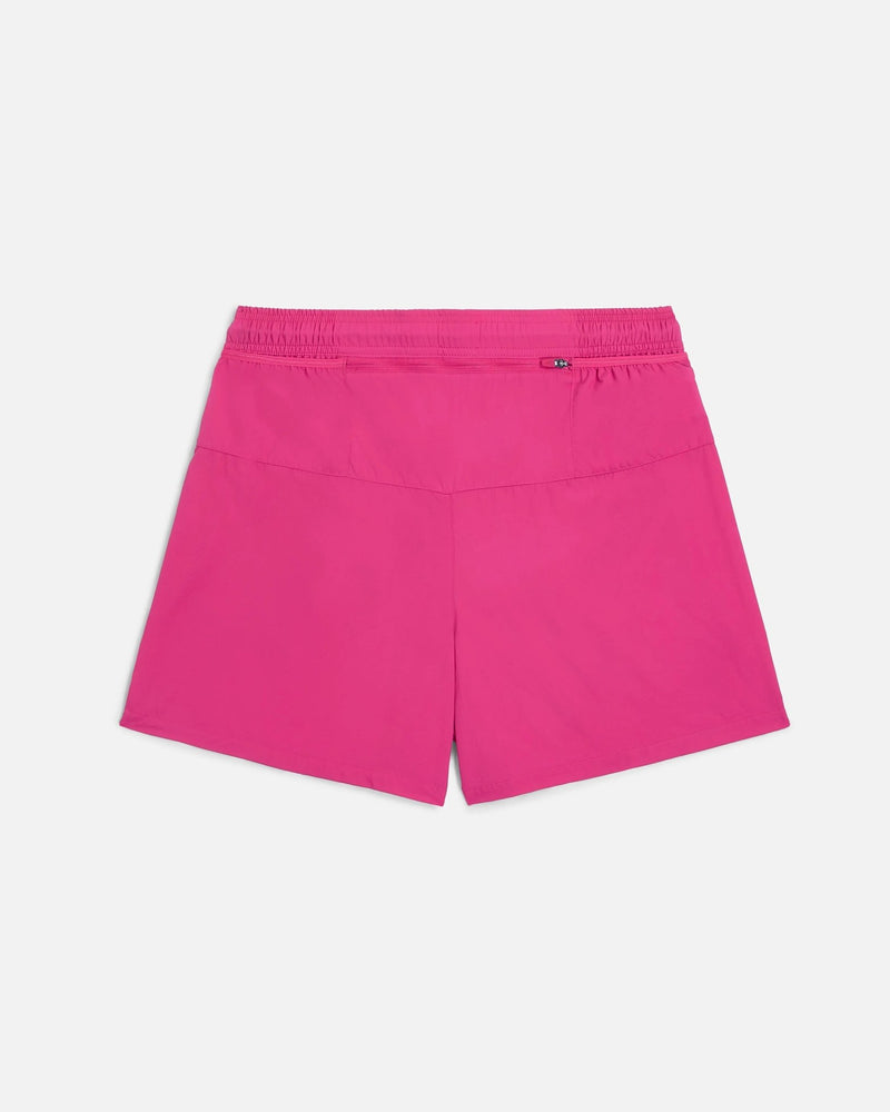 Back view of Nike x Patta Running Team shorts in vibrant Fireberry pink featuring a rear zippered pocket.
