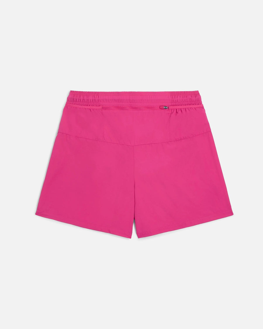 Back view of Nike x Patta Running Team shorts in vibrant Fireberry pink featuring a rear zippered pocket.