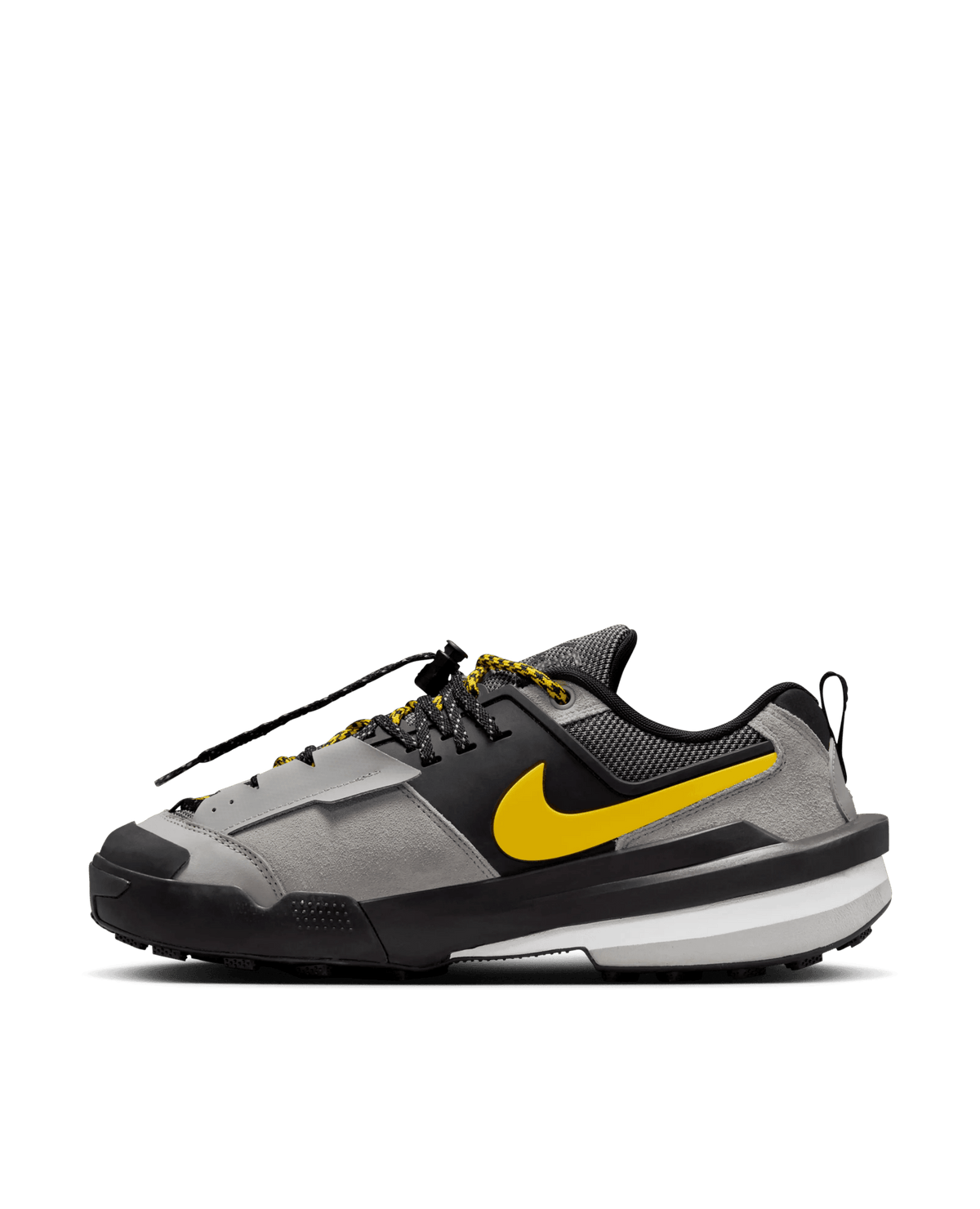 Side view of Nike Zegamadome x Sacai sneaker in matte silver suede and mesh with a vibrant tour yellow Swoosh.
