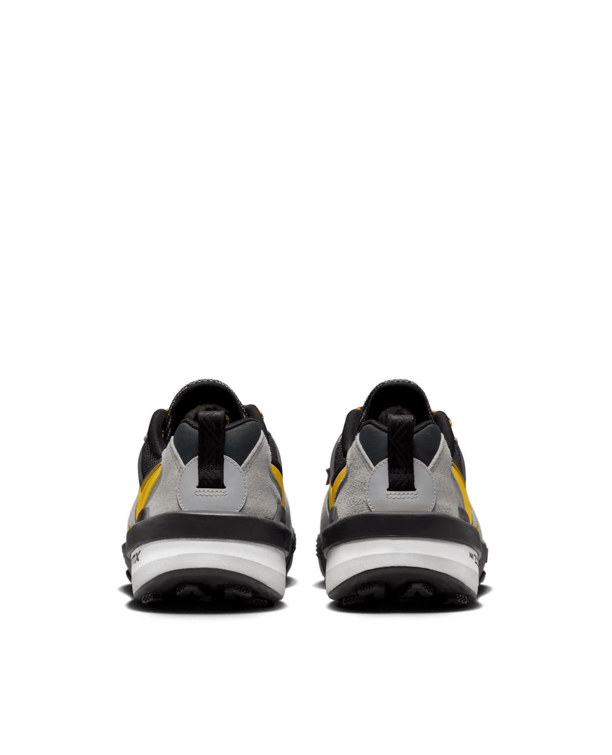 Rear view of Nike Zegamadome x Sacai sneakers in matte silver and tour yellow with layered heels.