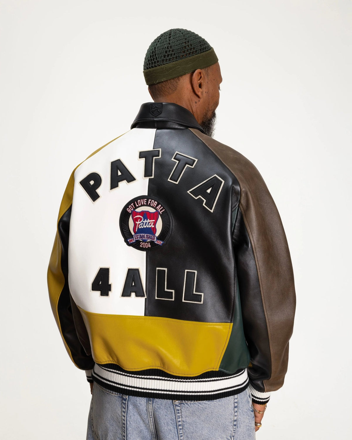 Back view of the Patta x Avirex multicolor leather Icon Jacket featuring Patta 4 All patches.