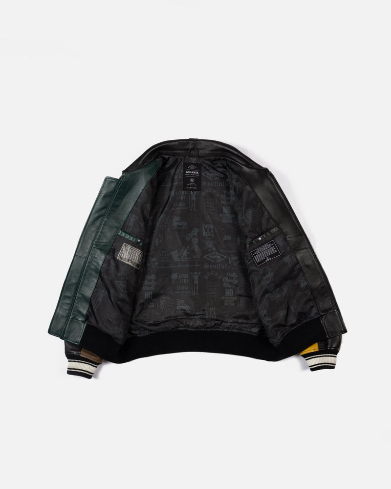 Inside graphic print lining of the Patta x Avirex Icon leather jacket.