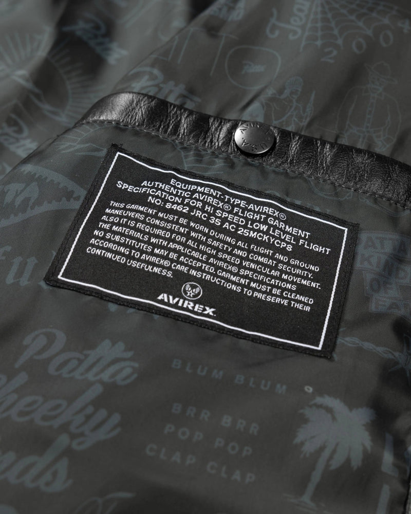 Close-up of the printed inner lining and Avirex patch on the Patta x Avirex Icon Jacket.