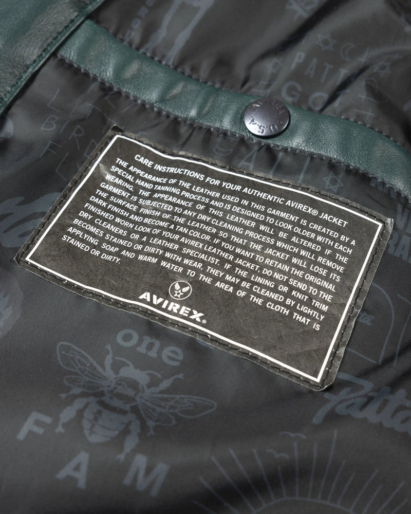 Interior lining and Avirex care instruction label on the Patta x Avirex Icon leather jacket.