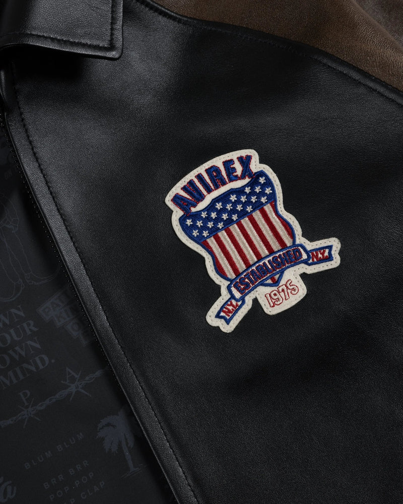 Embroidered Avirex shield patch on the black leather Patta x Avirex Icon Jacket.