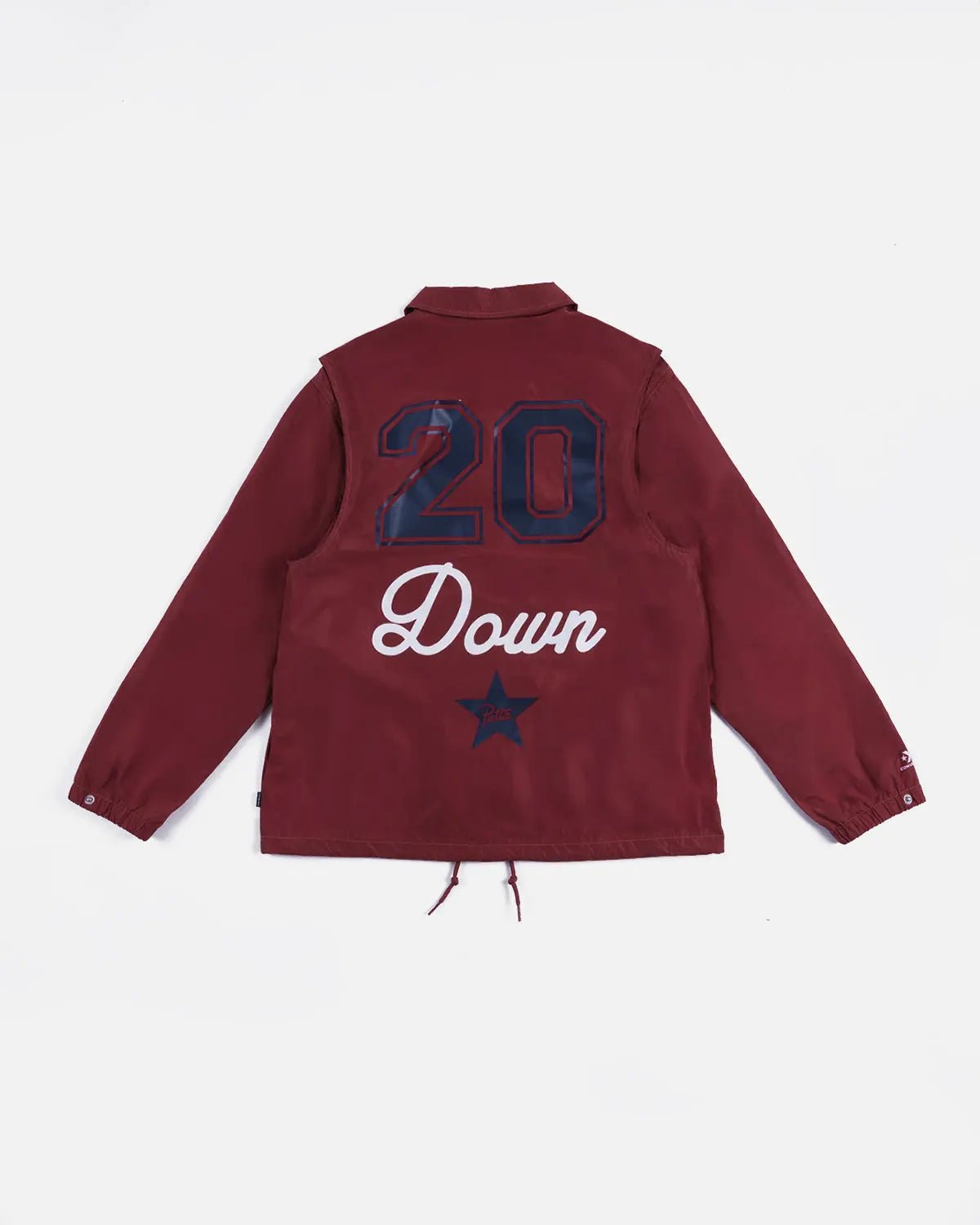 Back view of the garnet Patta x Converse coaches jacket with 20 Down anniversary graphic print.