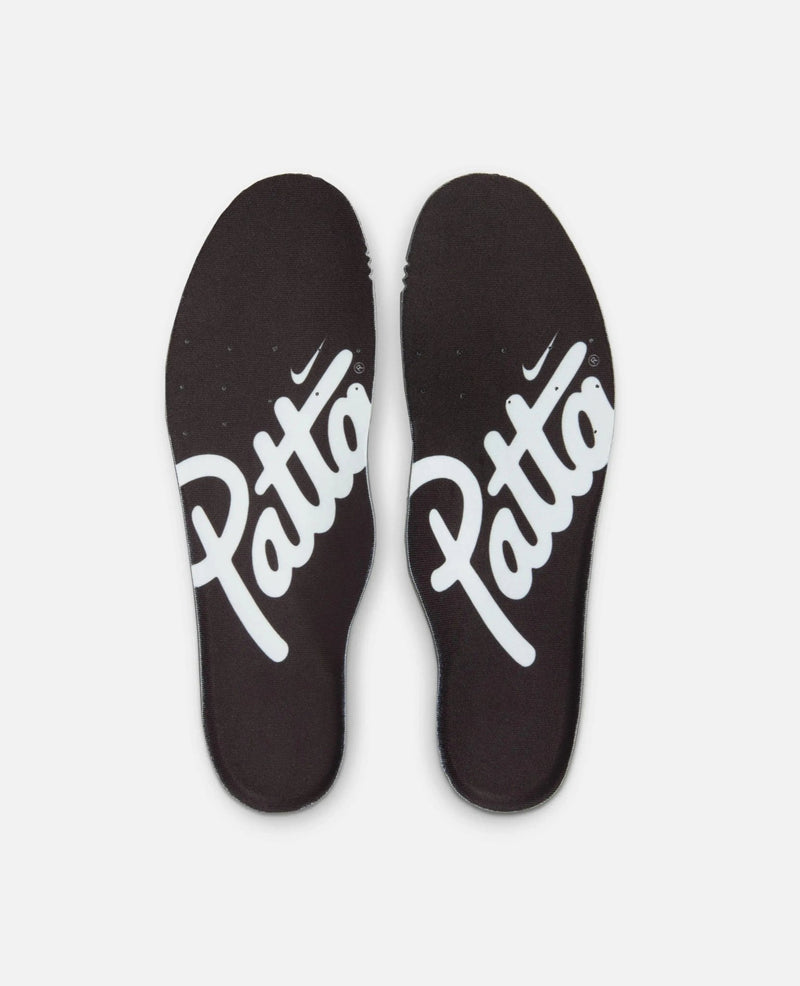 Black Patta x Nike Air Max 90 SP sneaker insoles featuring white Patta script branding.