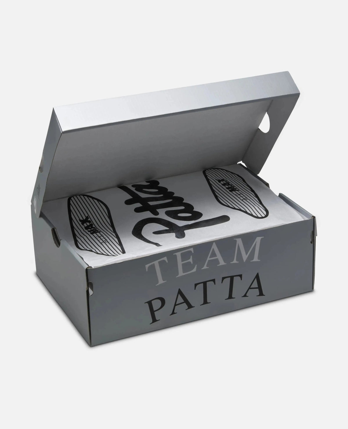 Silver Patta x Nike Air Max 90 shoebox with Team Patta lettering and branded wrapping paper.