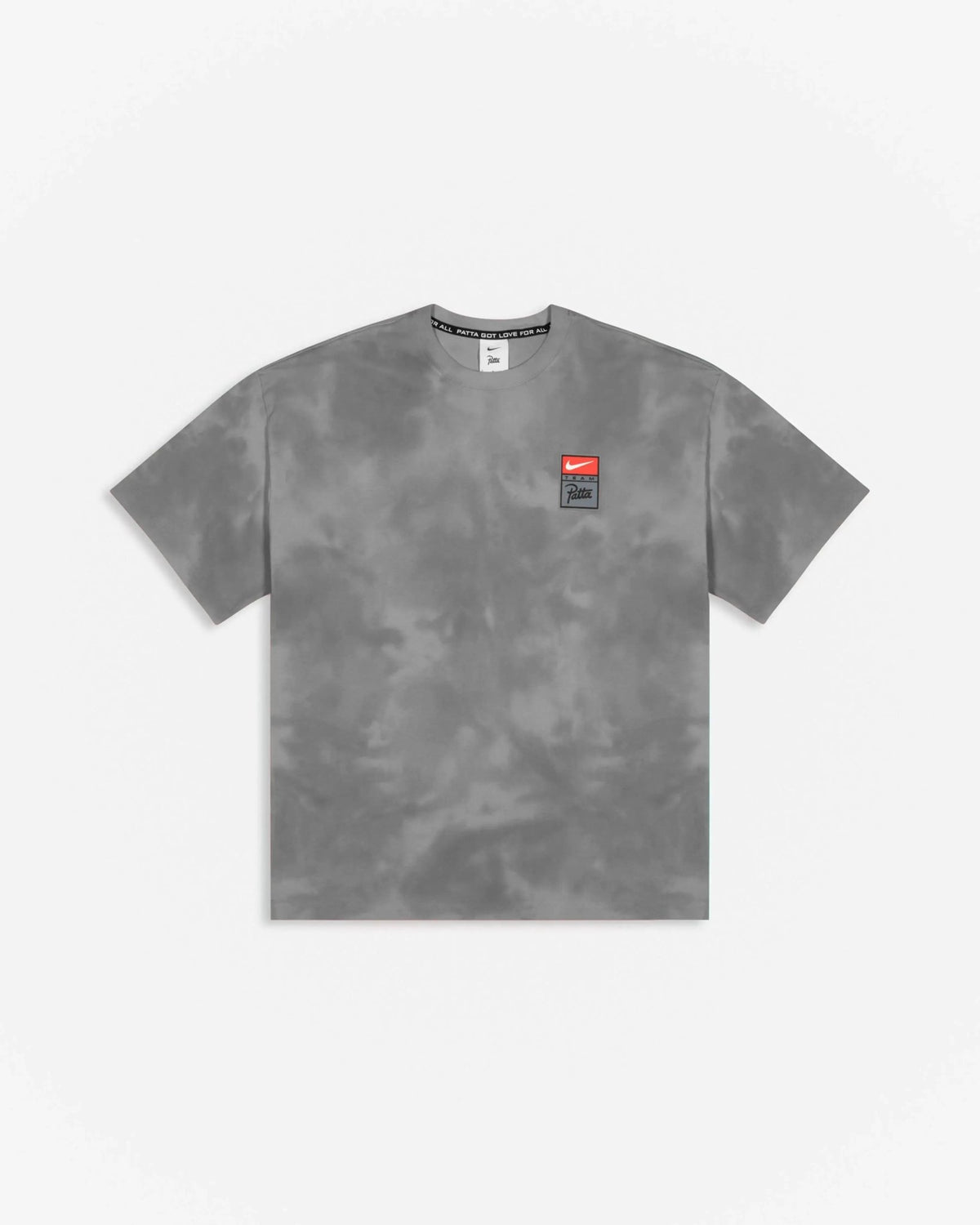 Patta x Nike NRG washed grey tie-dye T-shirt with chest badge against a plain white background.