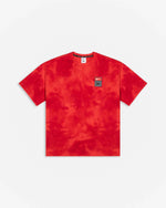 Front view of the Patta x Nike NRG washed red tie-dye t-shirt with a silicone chest badge.