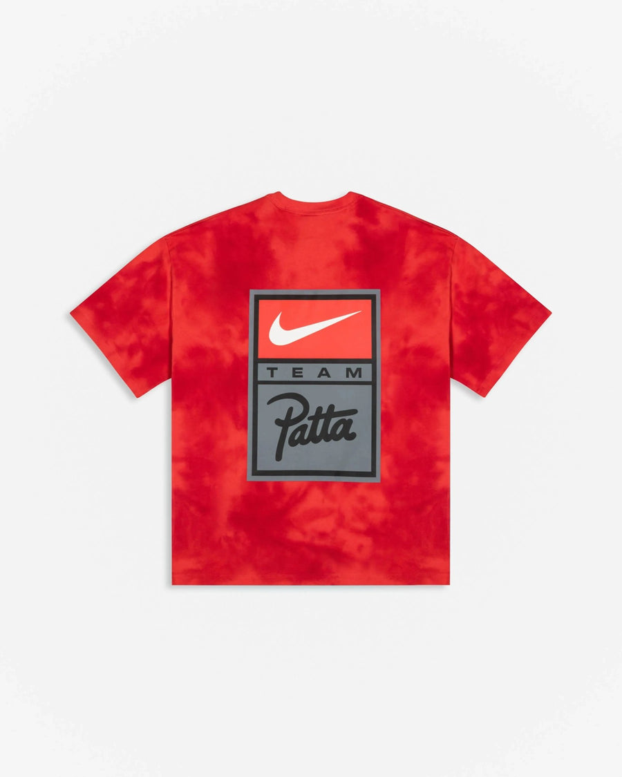 Back view of Patta x Nike NRG washed red tie-dye T-shirt featuring a large Team Patta Nike graphic badge.