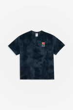 Patta x Nike NRG washed dark blue tie-dye cotton T-shirt with chest logo badge.