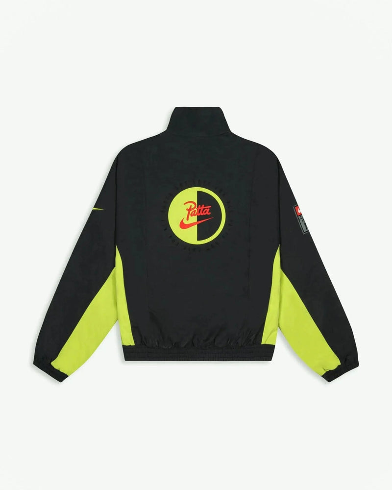 Back view of Patta x Nike NRG track jacket in black with cyber yellow side panels and logo applique.