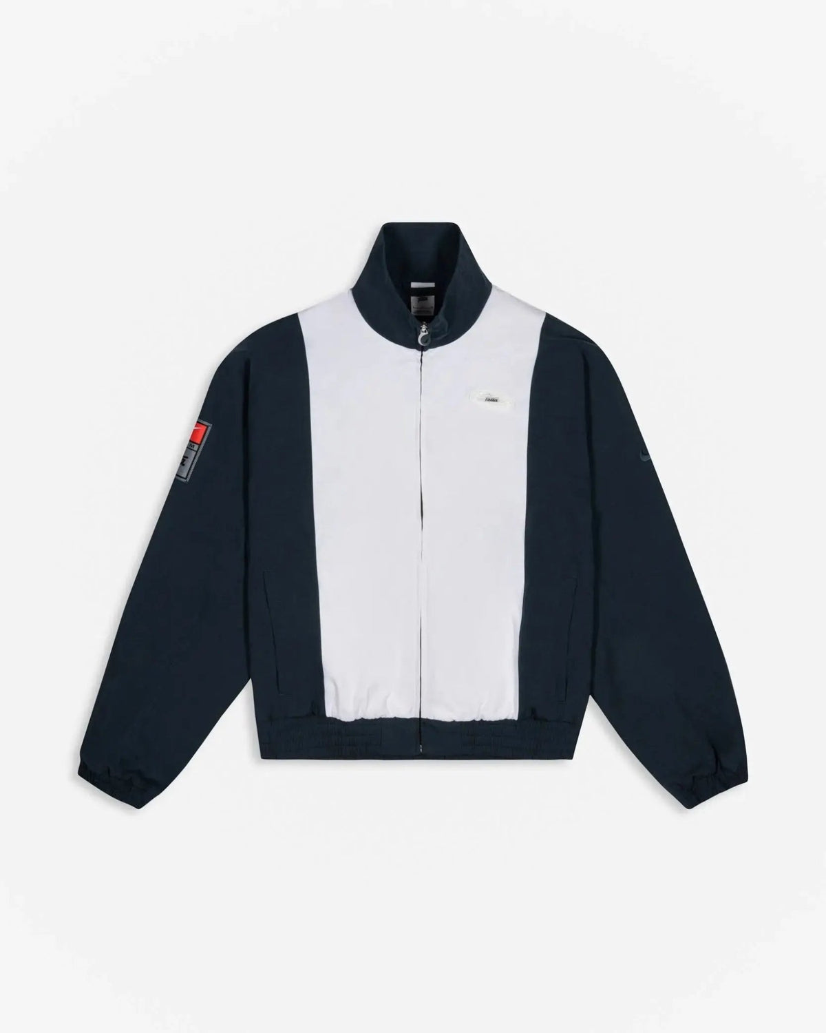 Patta x Nike NRG Track Jacket in deep ocean and white with contrast panels and full-zip front.