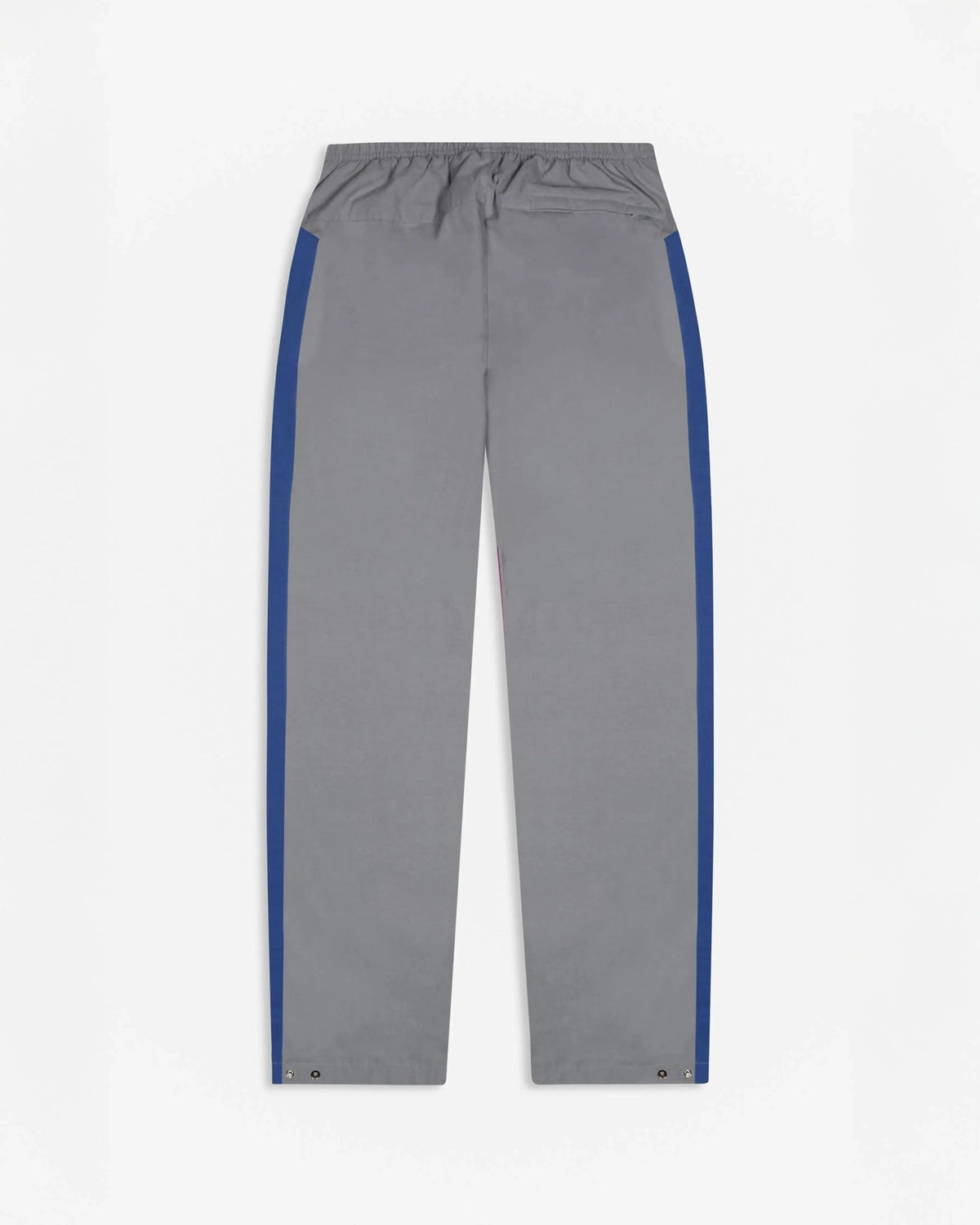 Back view of Patta x Nike NRG track pants in particle grey with sapphire blue side stripes.