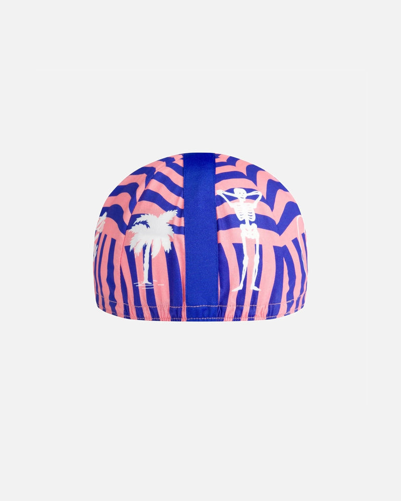 Back view of the Patta x Rapha Cap II in flamingo pink and royal blue featuring skeleton and palm tree graphics.