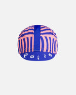 Patta x Rapha Cap II cycling cap in flamingo pink and royal blue with graphic print and branded brim.