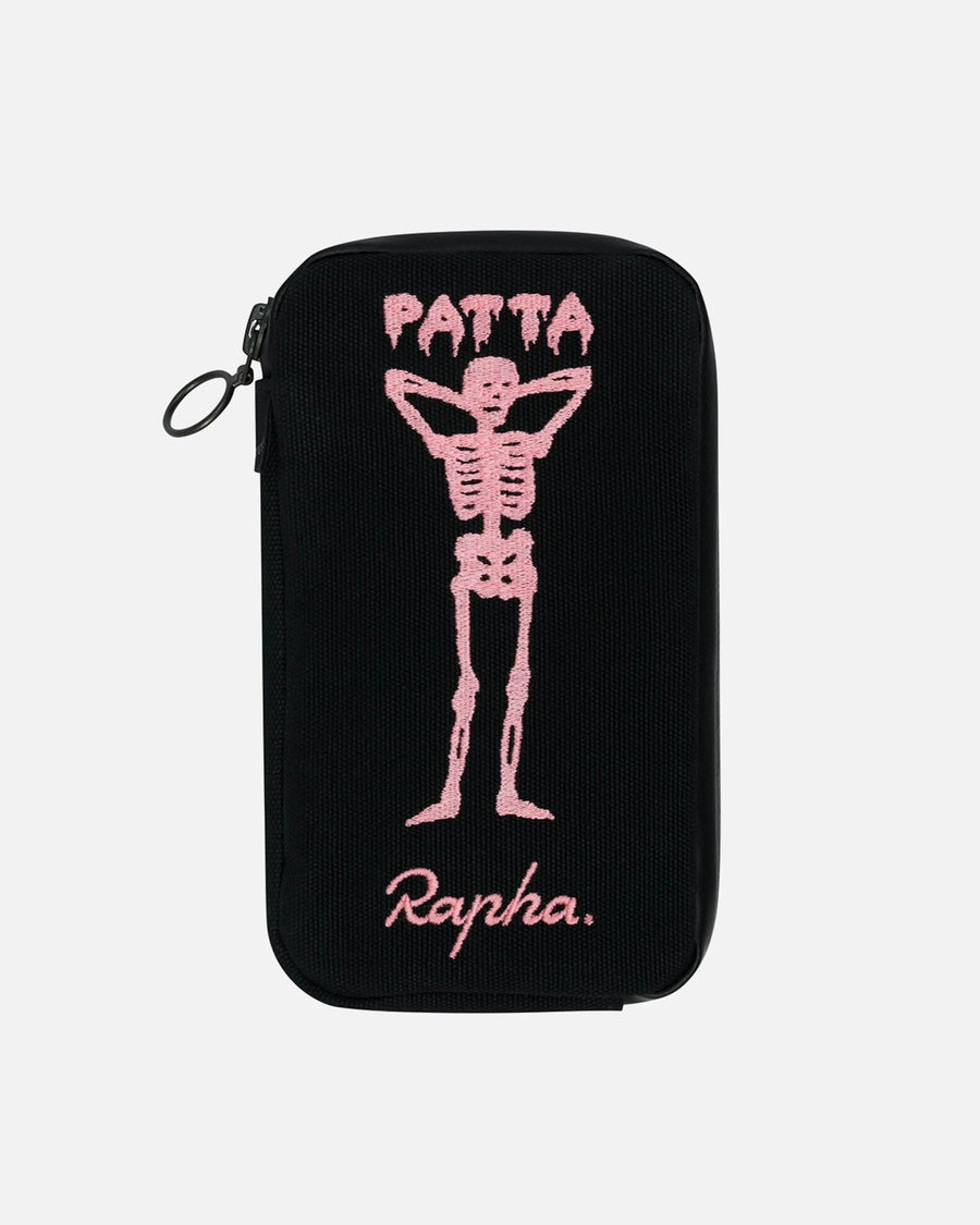 Black Patta x Rapha essentials case featuring pink embroidered skeleton graphic and logo details.