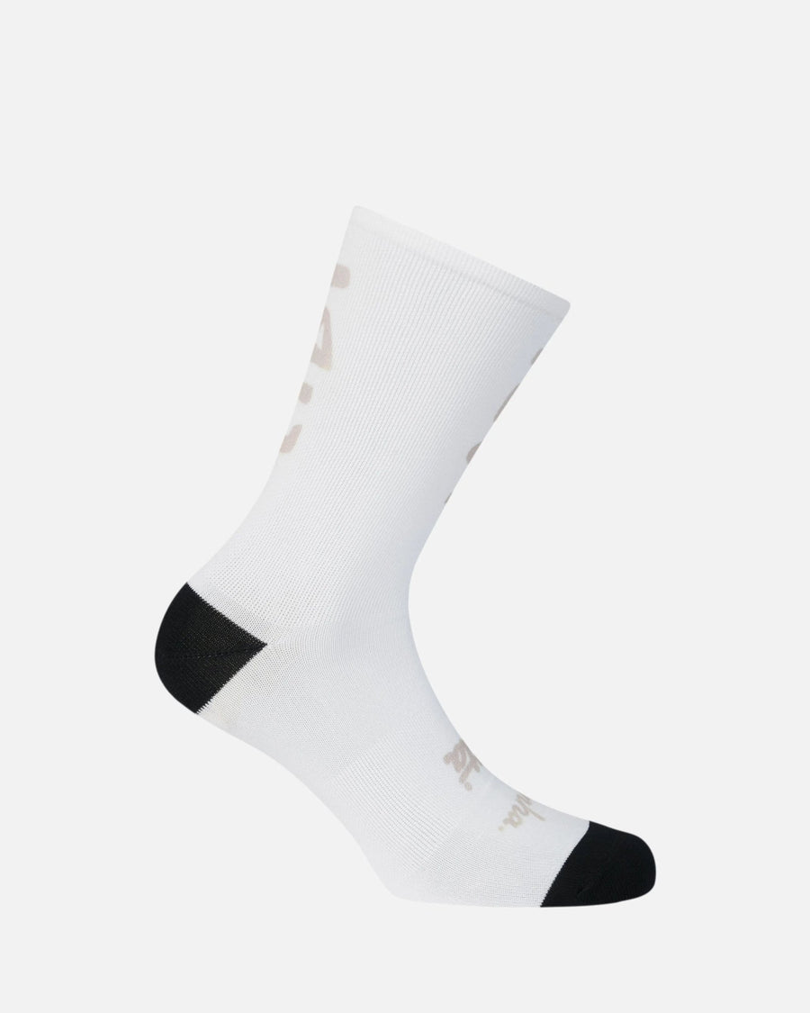 Patta x Rapha graphic sock in stone white with black heel and toe accents.