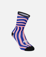 Patta x Rapha graphic sock featuring flamingo pink and royal blue stripes with black accents.
