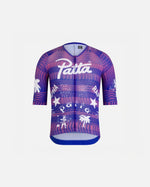 Patta x Rapha men's Pro Team aero cycling jersey in flamingo pink and royal blue with graphic prints.