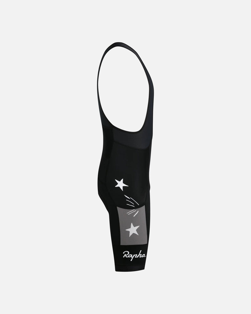 Side view of Patta x Rapha Men's Pro Team Cargo Bib Shorts in Black and Stone with star graphics.