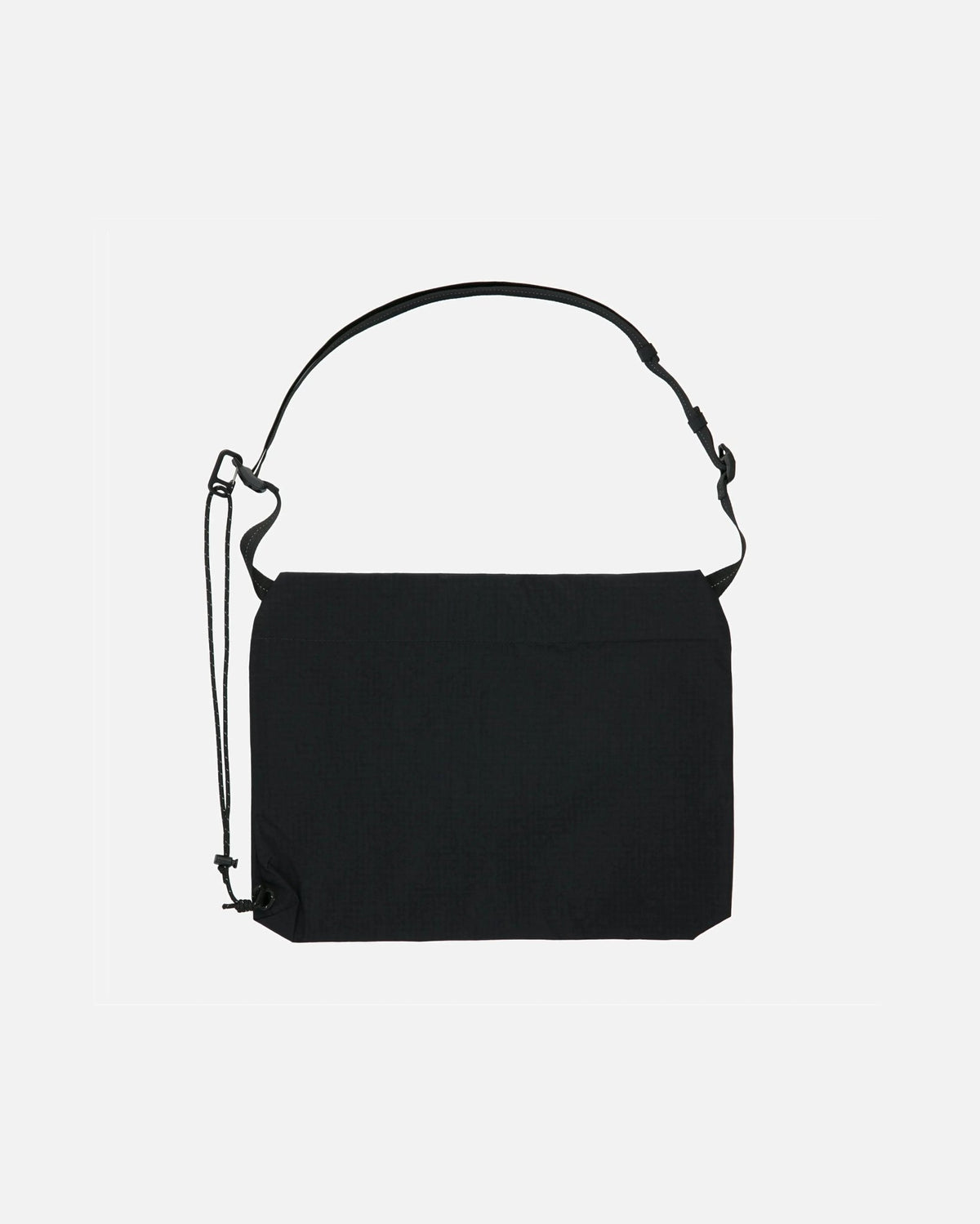 Back view of the Patta x Rapha Tech Musette nylon bag in black with adjustable strap.