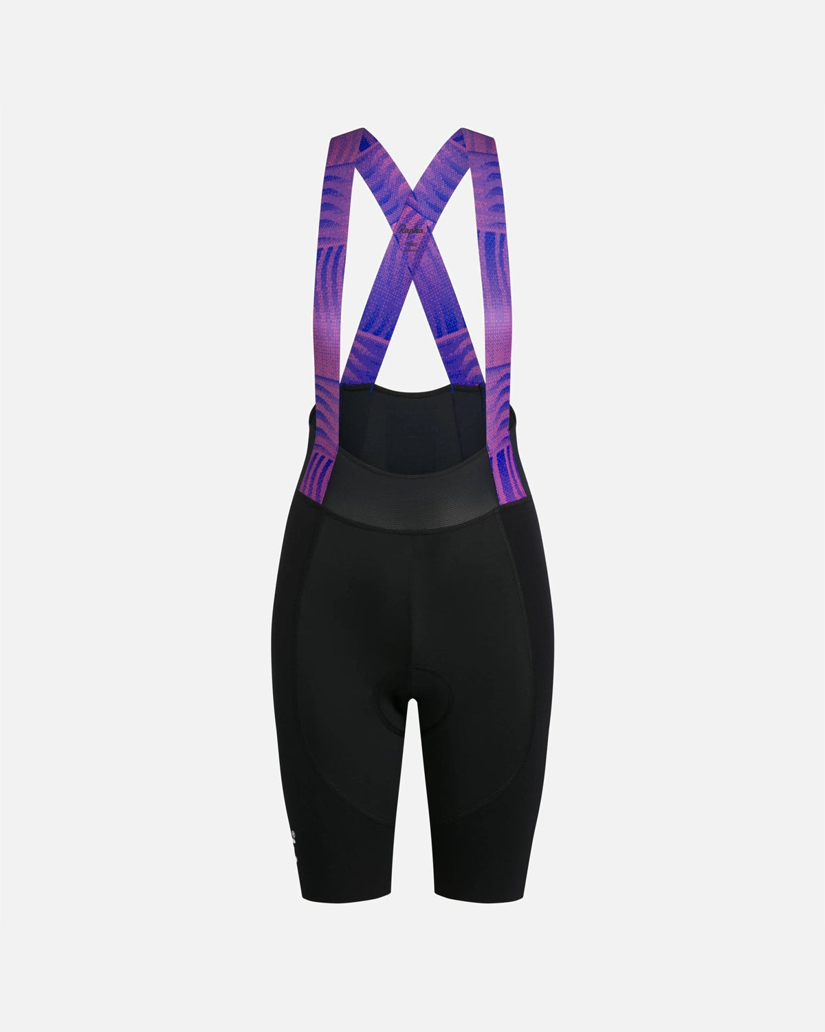 Back view of Patta x Rapha women's cycling bib shorts in black with pink and blue patterned straps.