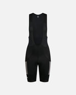 Front view of Patta x Rapha women's cargo bib shorts in black with stone mesh pockets.