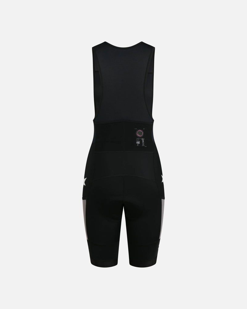 Back view of Patta x Rapha women's Pro Team cargo bib shorts in black and stone.