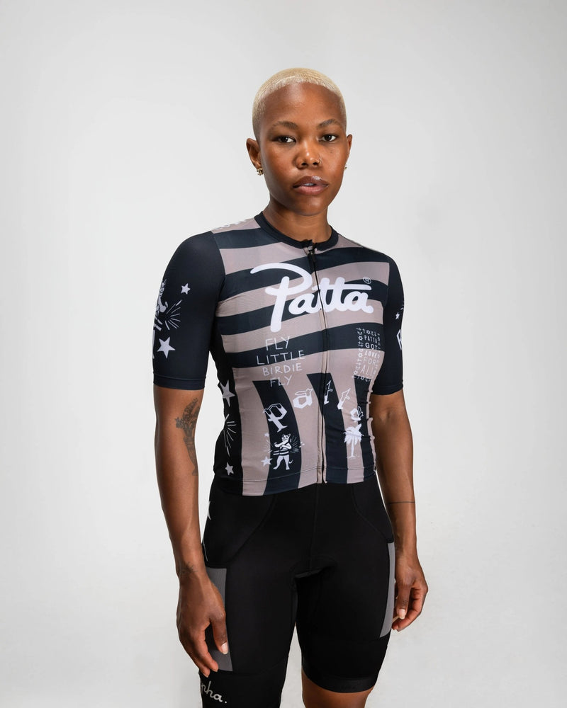 Front view of a model wearing the Patta x Rapha Women's Pro Team Training Jersey in black and stone.