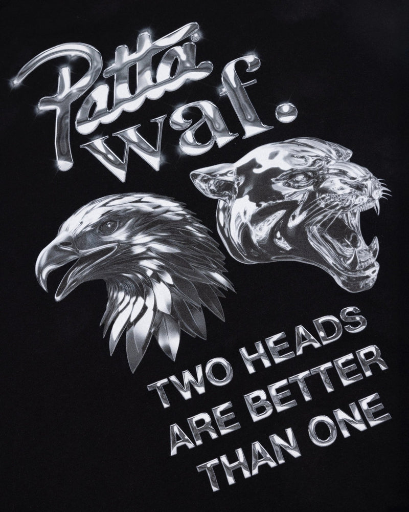 Close-up of the metallic eagle and panther graphic on the black Patta x waf. Homecoming kids t-shirt.